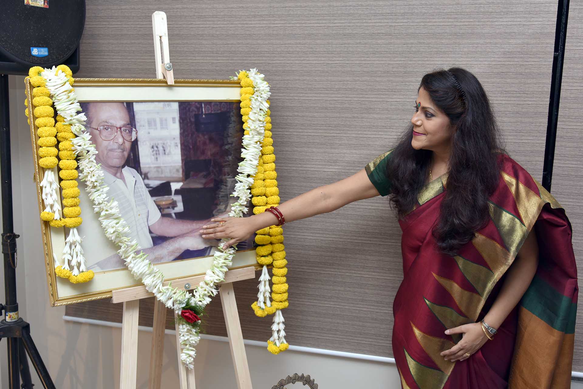 Smt Antara Chowdhury doing pranaam to her legendary father Salil Chowdhury